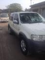 Gia đình cần bán Escape 2002 Xlt, màu trắng gia đinh sử dụng kỉ