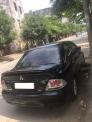 Cần bán xe Mitsubishi Lancer 1.8AT 2003 màu đen cọp