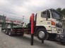 Xe tải hino 3 chân nâng đầu chở máy công trình