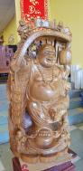 Tượng di lặc gánh gậy như ý