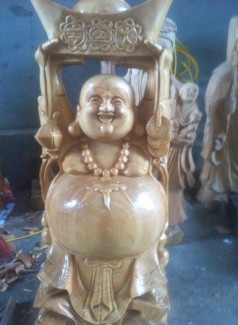Tượng Phật Dâng tiền gỗ Pơ MU