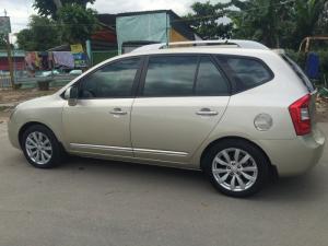 Cần bán Kia Caren 2.0 sx 2013 màu bạc