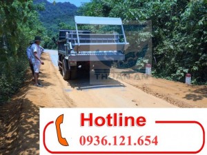 Máy rải đá dăm