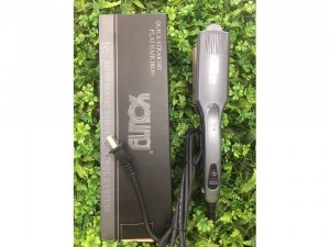 Máy duỗi kẹp