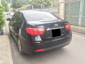 Cần bán Hyundai Avante 2013 số sàn màu đen long lanh