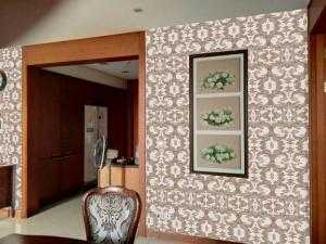 Vải dán tường sợi thủy tinh làm điểm nhấn cho mỗi bức tường thêm lung linh và đặc sắc.