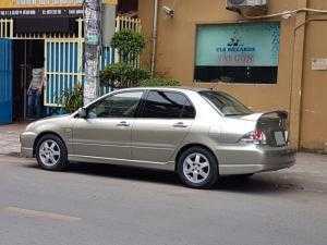 Bán em Mitsubishi Lancer 2005 đk 2007 tự động màu vàng đẹp