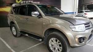 Bán Mitsubishi Pajero Sport máy dầu số sàn sản xuất 2016 màu vàng cát biển Sài Gòn