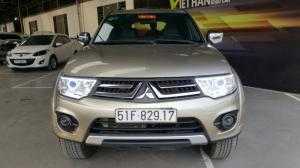 Bán Mitsubishi Pajero Sport máy dầu số sàn sản xuất 2016 màu vàng cát biển Sài Gòn