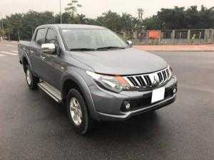 Cần bán xe Mitsu Triton 2015 số sàn màu xám bạc