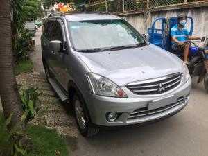 Muốn bán Mitsubishi Zinger sx 2011 màu bạc tự động xe chính chủ đẹp.