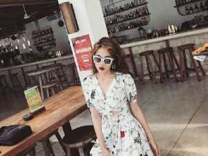 Đầm xòe hở bụng cột eo j hoạ tiết -