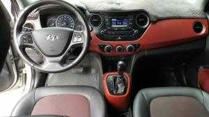 Bán Hyundai Grand i10 1.2AT màu bạc số tự động nhập Ấn Độ 2014 biển Sài Gòn bản 5 cửa