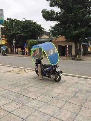 Ô che mưa nắng xe máy