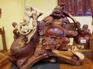 Tượng di lạc kéo bao tiền