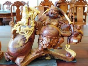 Tượng di lạc kéo bao tiền