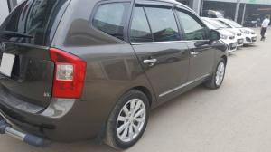 Cần bán xe Kia Carens 2012 tự động màu nâu titan