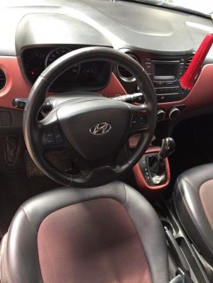 Bán Hyundai I10 1.2AT màu bạc số tự động nhập Ấn Độ 2014 bản 5 cửa biển Sài Gòn lăn bánh 38000km