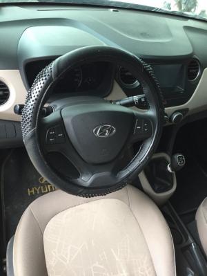Bán Hyundai Grand i10 sedan 1.2MT bản đủ số sàn sản xuất 2018 màu bạc lăn bánh 4000km