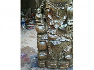 Tượng di lặc đứng tiền