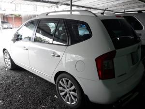 Bán Kia Carens SX 2.0AT màu trắng số tự động sản xuất 2013 biển Sài Gòn 1 chủ đi 35000km