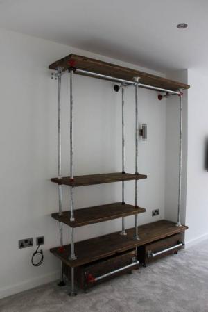 Kệ ống nước trang trí shop