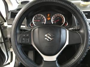Bán Suzuki Swift 1.4AT màu trắng camay số tự động biển Sài Gòn sản xuất cuối 2016 chạy đúng 13000km