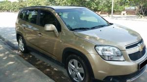 Cần bán gấp xe Chevrolet Orlando đời 2012 bản LTZ,số tự động,màu vàng cát