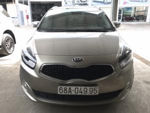 Bán Kia Rondo GAT 2.0AT màu vàng cát số tự động sản xuất 2016 đi 33000km
