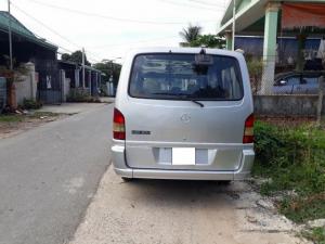 Cần bán xe Mercedes MB100 loại 9 chổ ngồi đời 2004 màu bạc