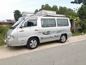 Cần bán xe Mercedes MB100 loại 9 chổ ngồi đời 2004 màu bạc