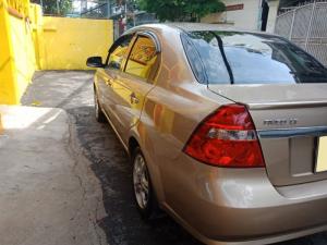 Cần bán con Chevrolet Aveo 2017 LT số sàn màu vàng cát