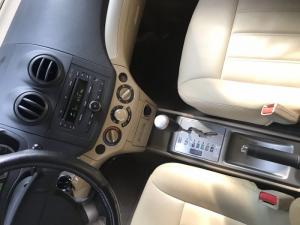 Bán Chevrolet Aveo LTZ 1.5AT màu trắng số tự động sản xuất 2016 biển Sài Gòn đẹp đi đúng