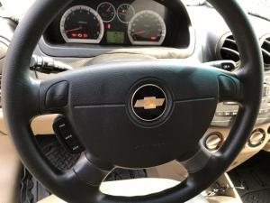 Bán Chevrolet Aveo LT 1.5MT màu vàng cát số sàn sản xuất 2016 biển Sài Gòn đi 48000km