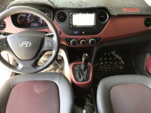 Bán Hyundai Grand i10 sedan 1.2AT màu trắng số tự động sản xuất 2018 bản gia đình lăn bánh 11000km