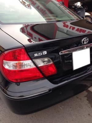 Gia đình cần bán camry 2004, số tự động, bản 3.0 v6. màu đen zin cọp
