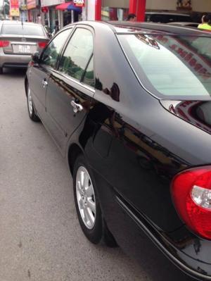 Gia đình cần bán camry 2004, số tự động, bản 3.0 v6. màu đen zin cọp