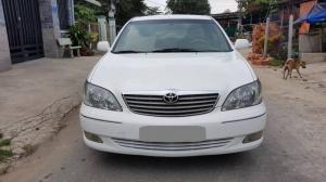 Cần bán gấp Toyota Camry 2002 số sàn. Xe màu trắng ngọc trinh