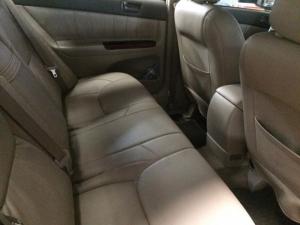 Gia đình cần bán xe Camry 2003, số sàn, màu đen, xe còn mới tinh