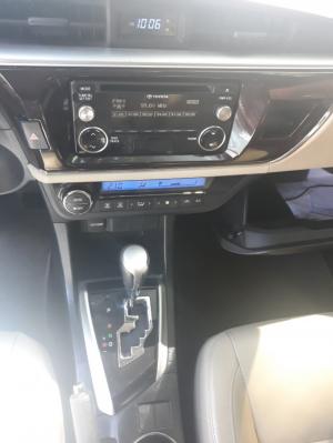 Bán Toyota Altis 1.8G màu nâu titan số tự động sản xuất cuối 2014 mới 90%