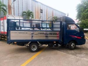 xe tải JAC 1,25 tấn trắng mỡ bững hông
