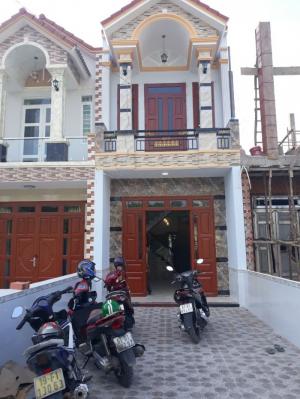 Bán nhà 1 trệt 1 lầu buôn bán tốt,đường ống nước,gần chợ đông hòa,dĩ an,bình dương