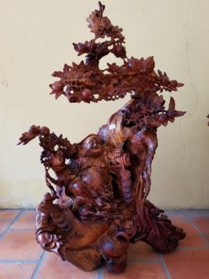 Di lặc thông thái dưới gốc đào hương tự nhiên