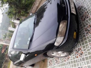 Cần bán xe mazda 323 đời 99 màu đen