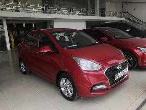 Bán Hyundai Grand i10 sedan 1.2AT màu đỏ số tự động sản xuất 2018 biển tỉnh đi 9000km