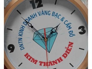 đồng hồ treo tường in logo tiệm vàng