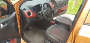 Hyundai Grand i10 1.2AT màu cam 2016