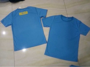 Chuyên may áo cổ tròn xanh ya vải hạt mè
