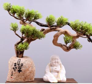 Tượng Tiếu Phật gốm trắng