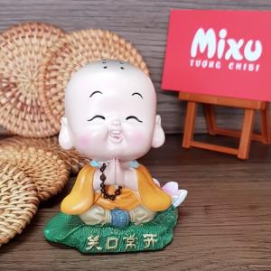 Tượng chibi chú tiểu tươi cười